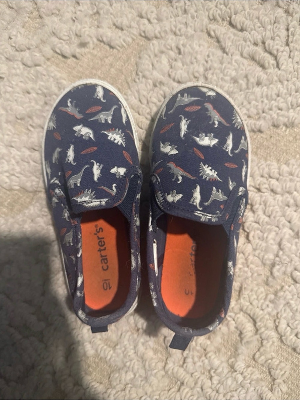 Carter's Navy Slip-On Sneakers with White Dino Print and Orange Insole